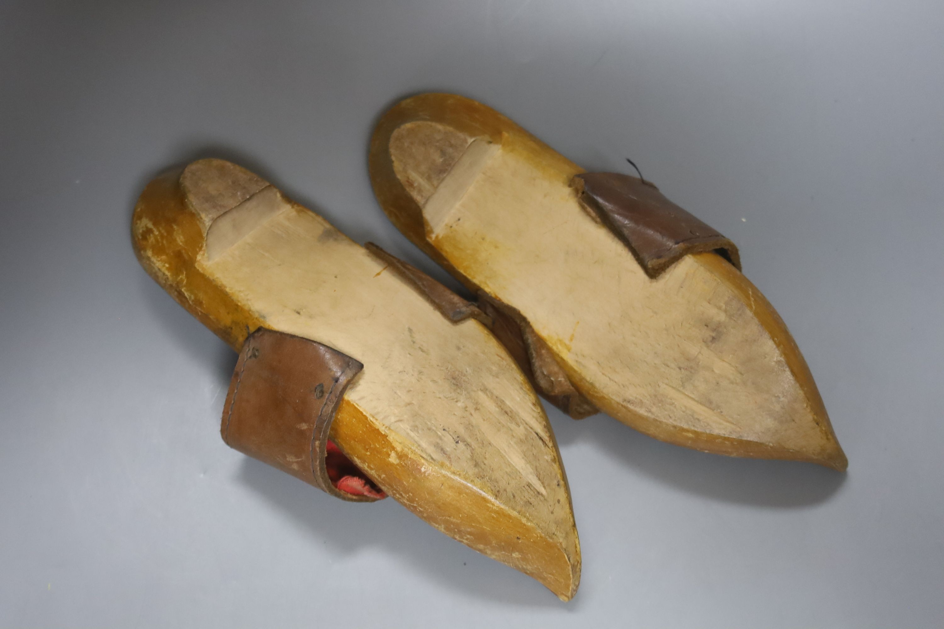 A pair of Eastern carved shoes 28cm